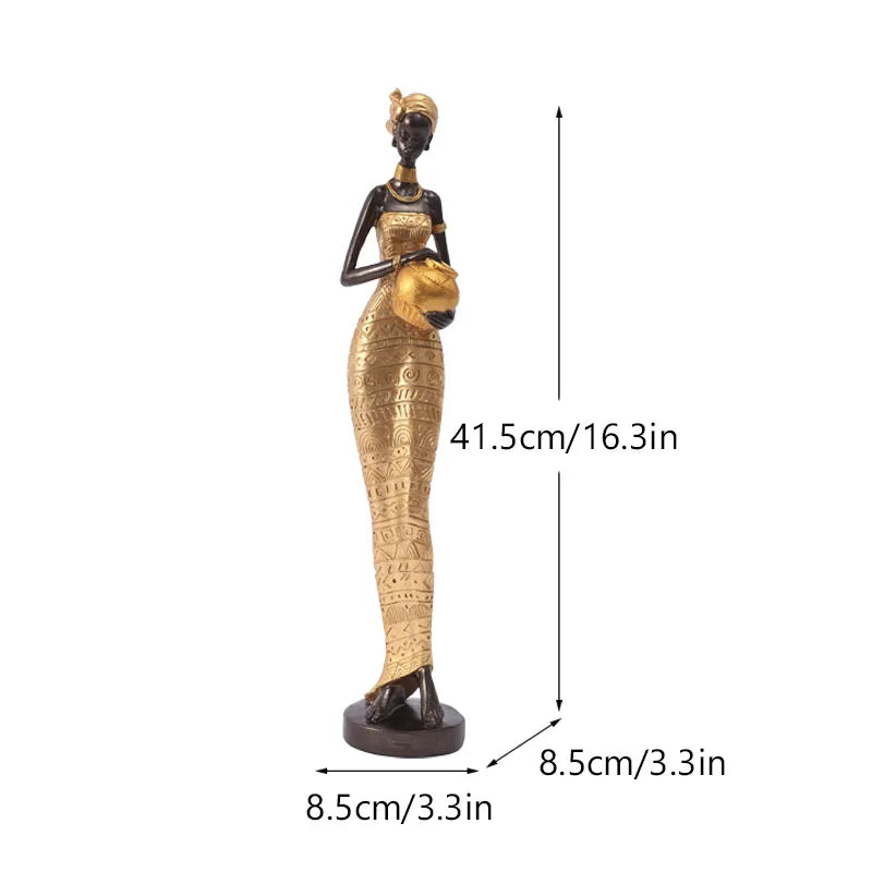Gold African resin woman statue holding a gold pot, 41.5cm tall with 8.5cm base, tribal patterned dress